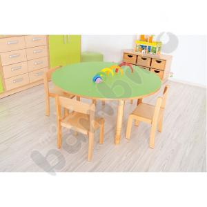 Round green Flexi table with 4 Krzyś beech chairs, size 1